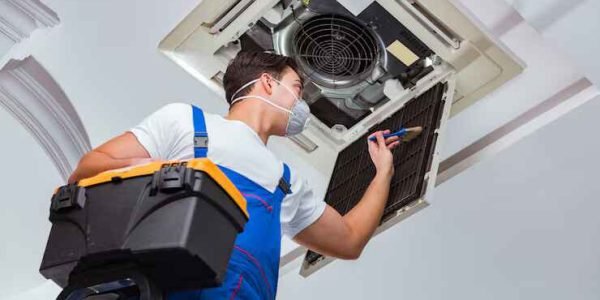 worker-repairing-ceiling-air-conditioning-unit_85869-7023 (1)